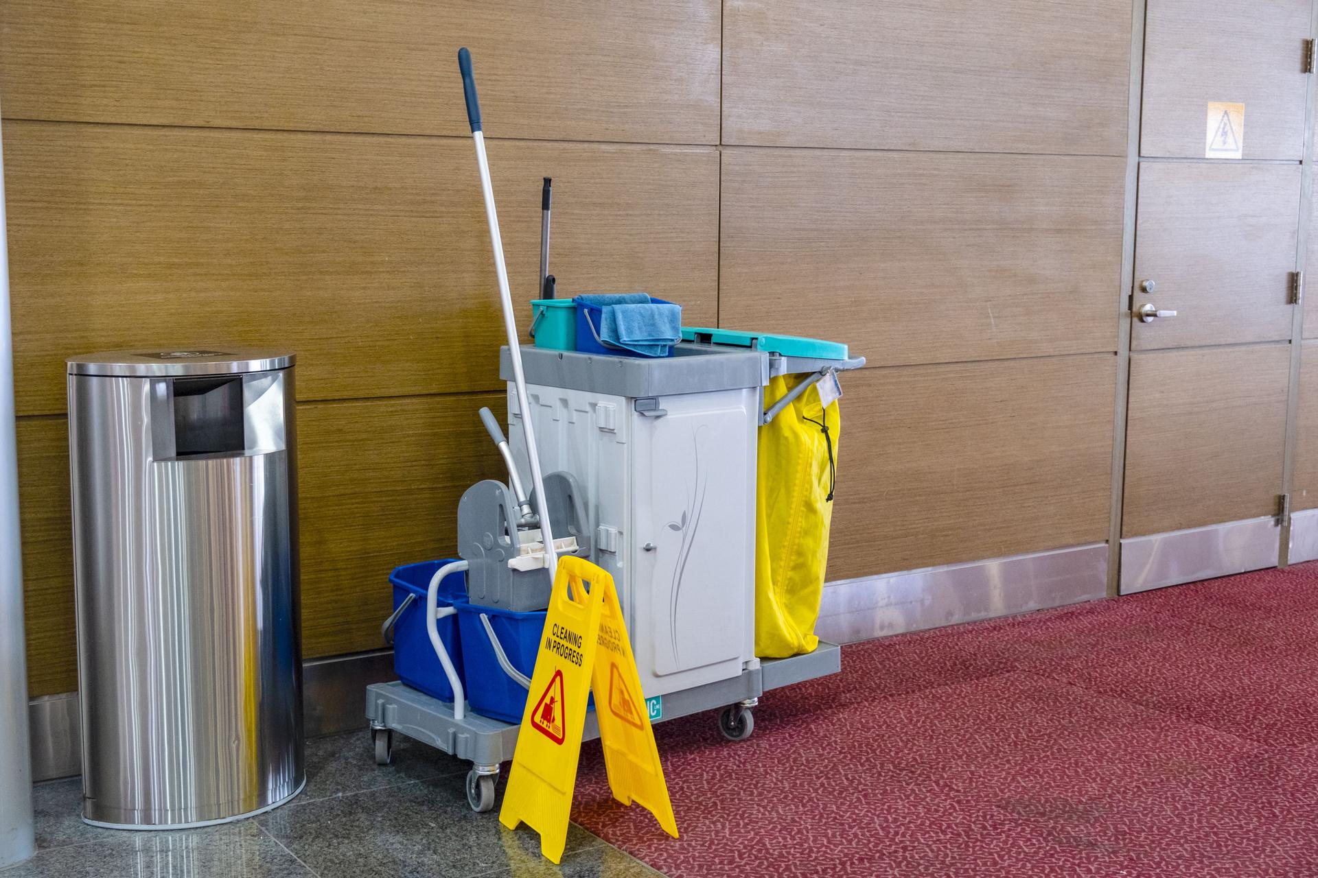 Janitorial Cleaning Cart in Commercial Building Hallway